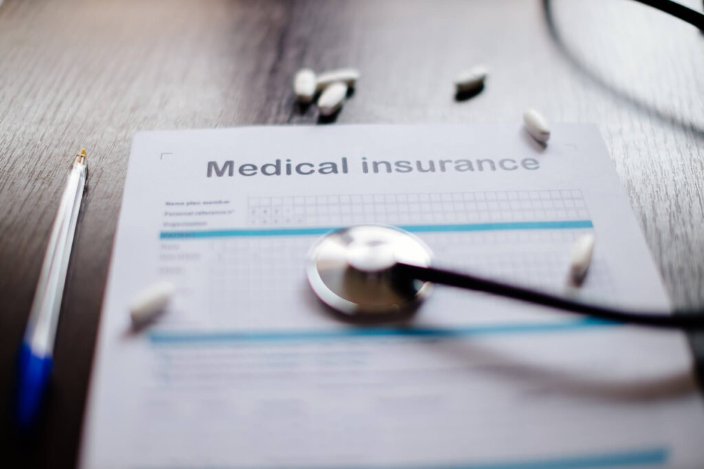 how much emergency medical travel insurance do i need